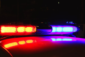 Lit up police car lights during nighttime