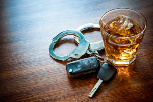 An alcoholic drink and car keys